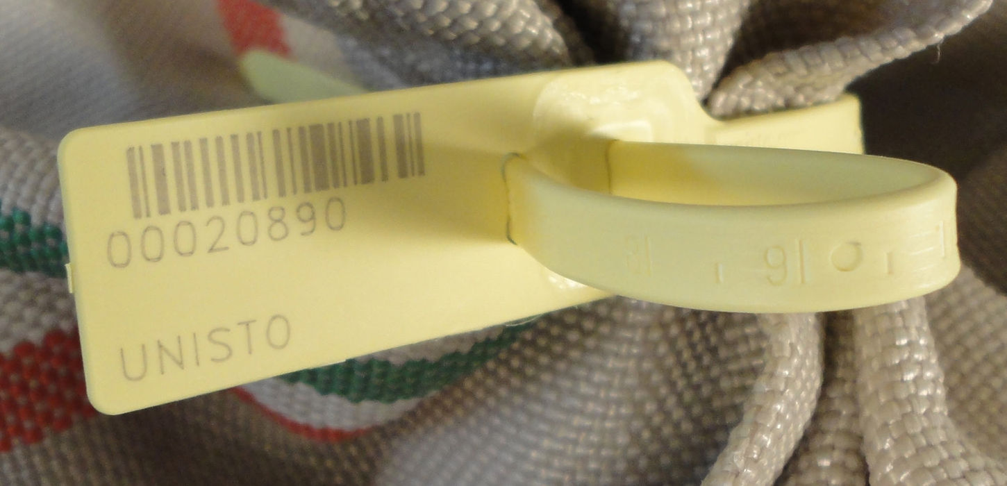 Unisto Varis security seal applied to a postal bag