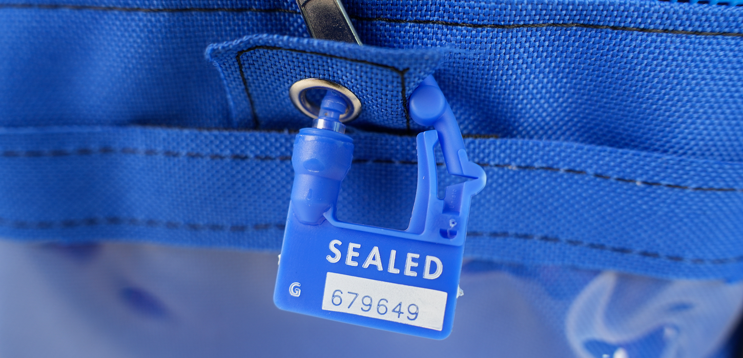 Unisto Multi-use Safebag with tamper-evident security seal close up